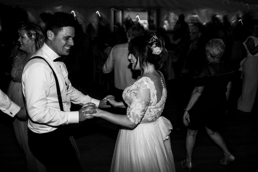 Bride and groom dancing at their wedding reception at Boswell's Coach House wedding venue